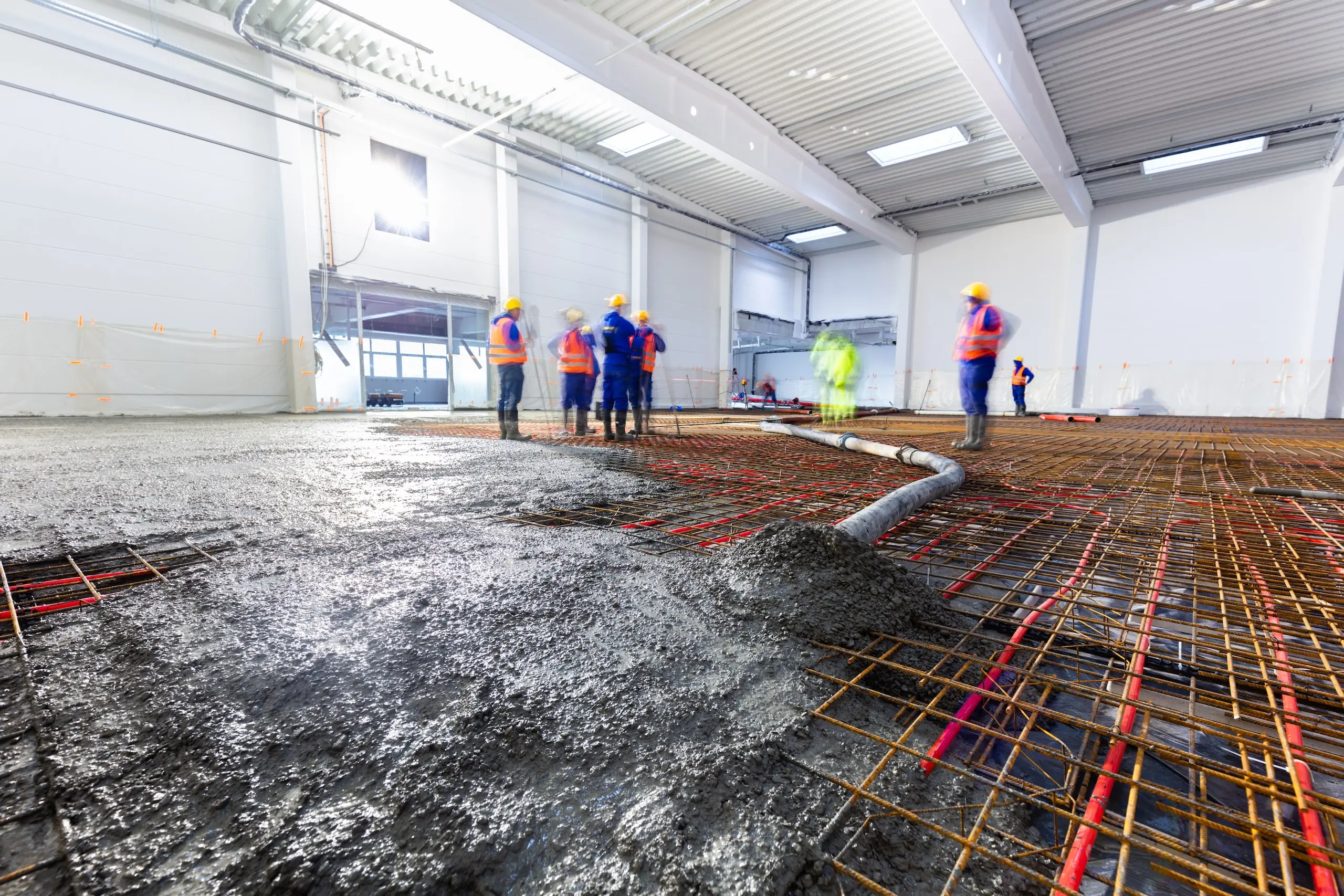 workers-do-concrete-screed-on-floor-with-heating-i-2022-12-16-11-04-33-utc-min