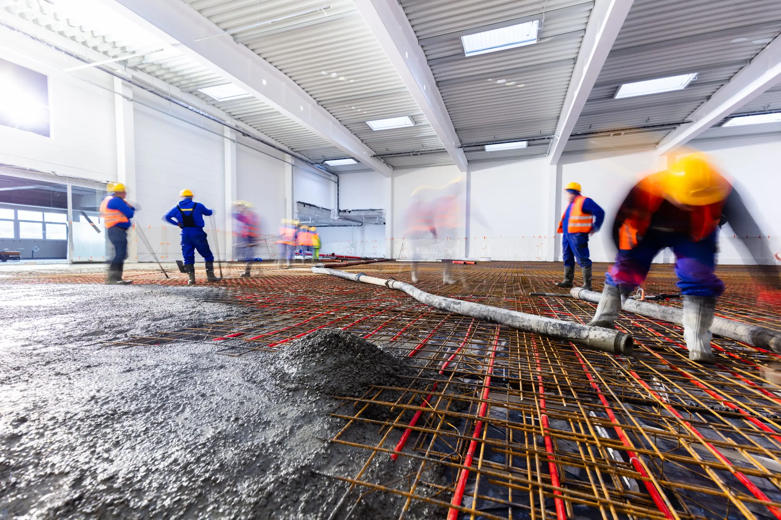workers-do-concrete-screed-on-floor-with-heating-i-2022-12-16-11-08-23-utc-min