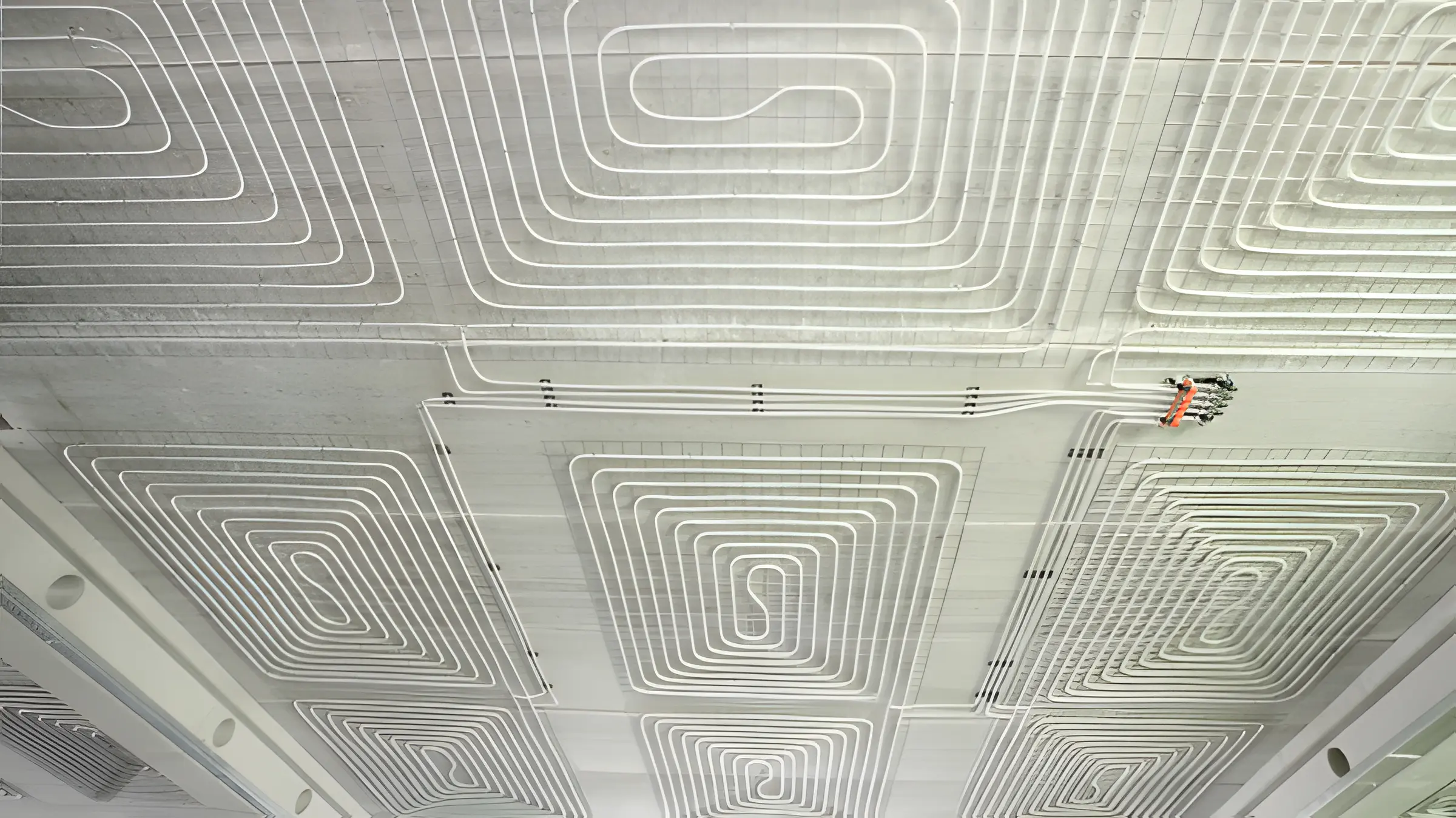 Ceiling cooling installation on laying grid system in construction