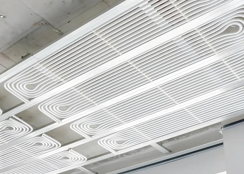 Ceiling cooling panels installed in an open-plan office for silent cooling