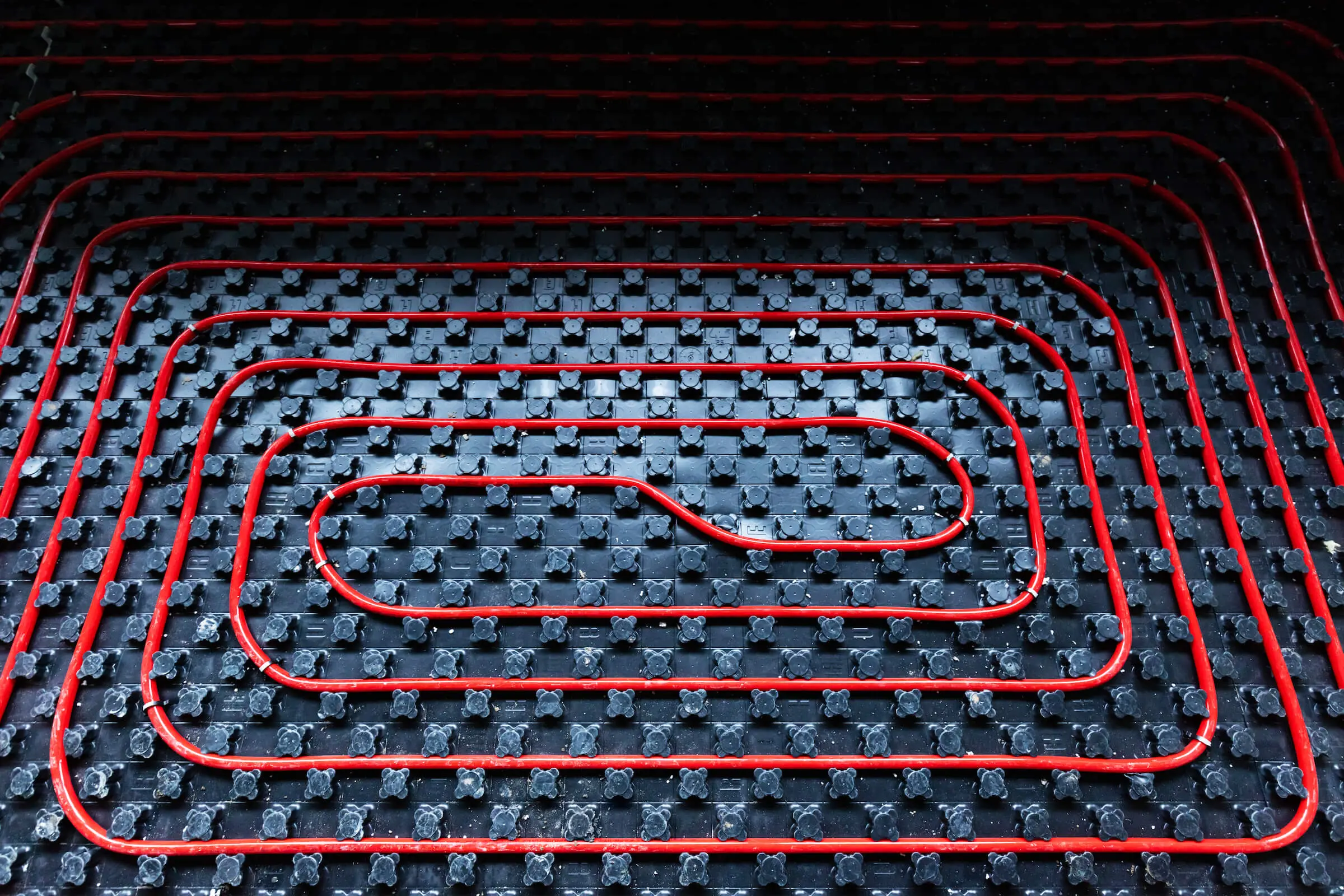 Fluxbite underfloor heating pipes installation on bubble wrap systems